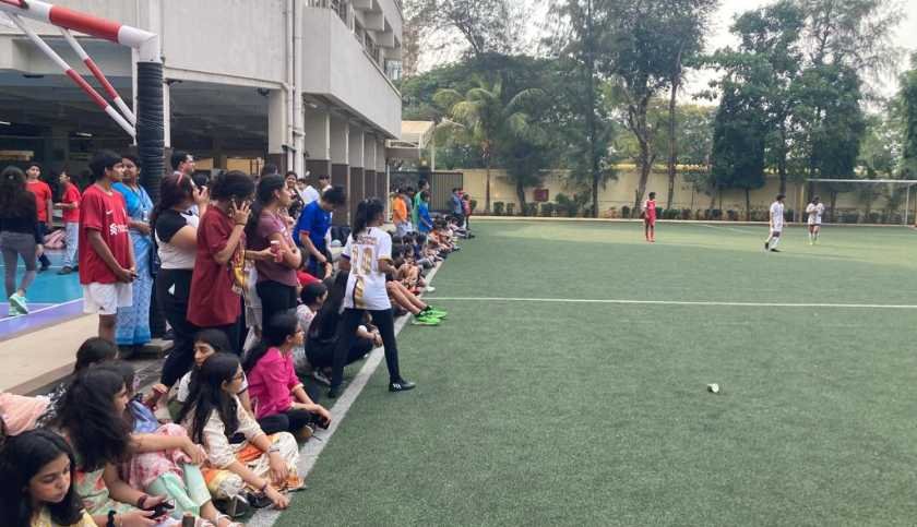 Students and Teachers watching football match